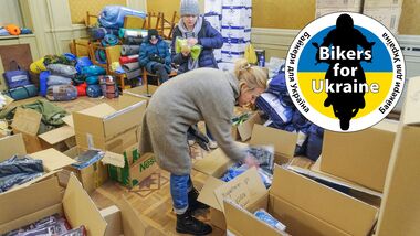 Volunteers sort humanitarian aid in the western Ukrainian  