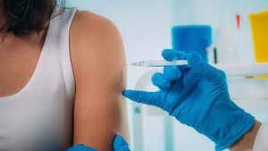 Woman being vaccinated, Schutzimpfung, Impfpass